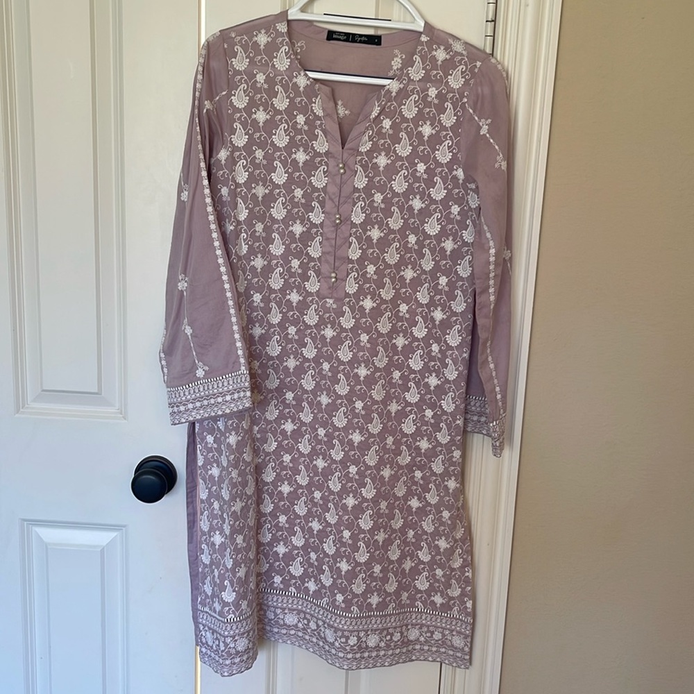 Image Pakistani Indian kurta mauve color with full white embroidery.